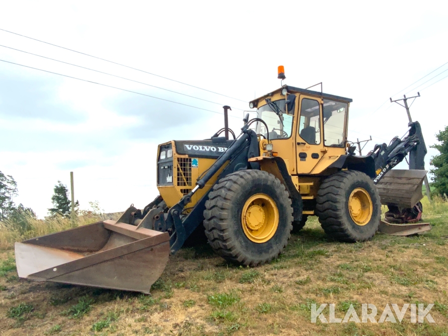 Grävlastare Volvo BM 6300 med tiltrotator och 4 skopor