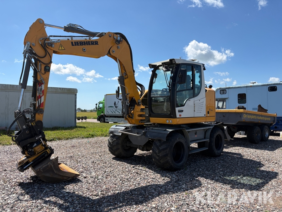 Grävmaskin Liebherr 910 Compact med tippkärra