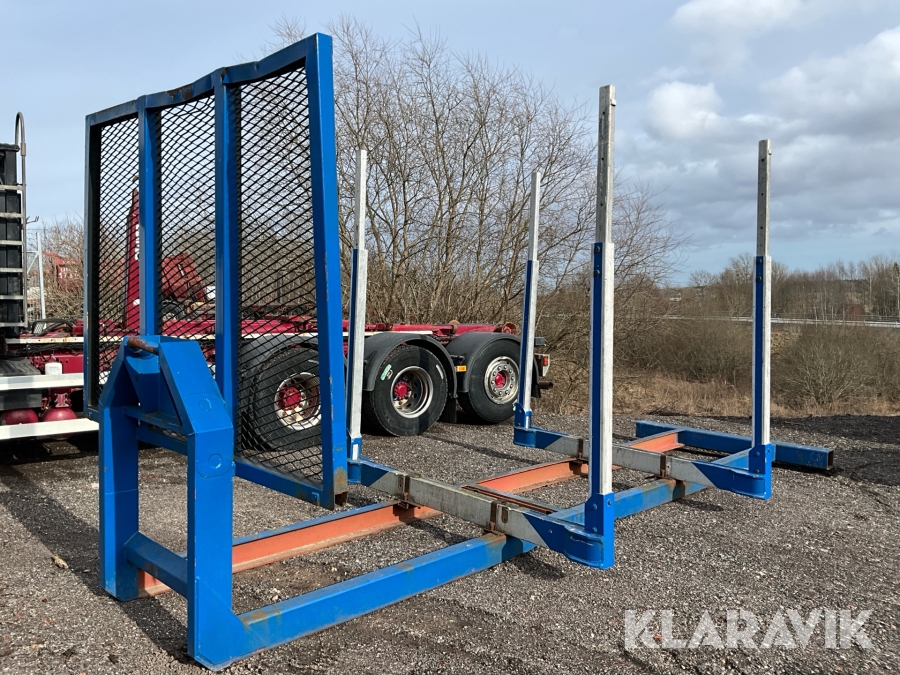 Lastväxlarram med timmerbankar
