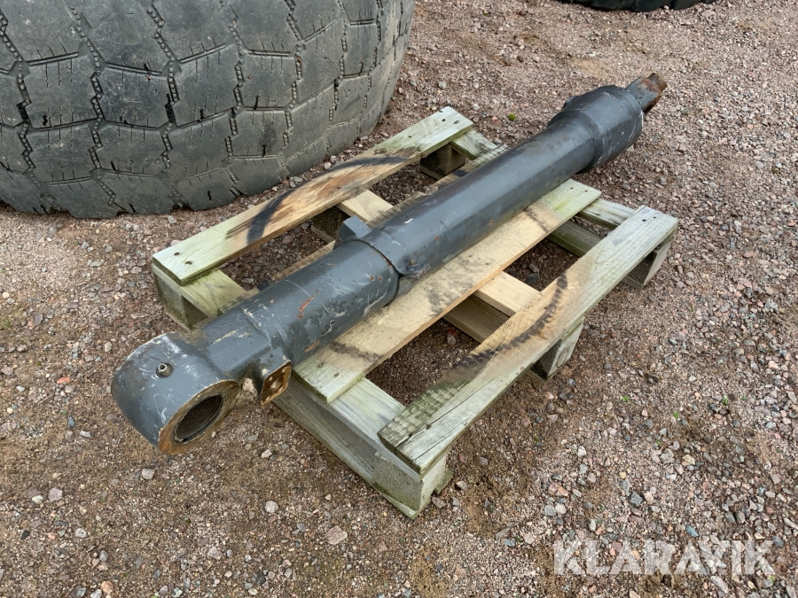Kolv för grävmaskin
