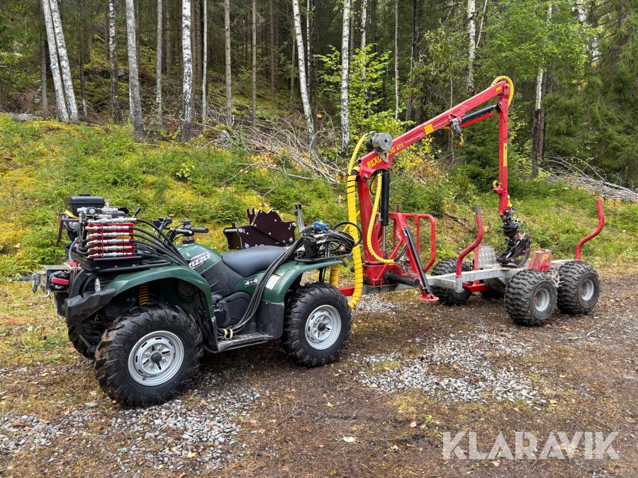 Fyrhjuling Yamaha Grizzly 450 med skogsvagn Kranman