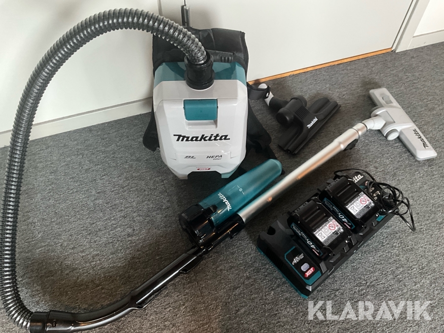 Ryggburen dammsugare Makita VC008G med laddstation och batterier