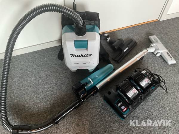 Ryggburen dammsugare Makita VC008G med laddstation och batterier