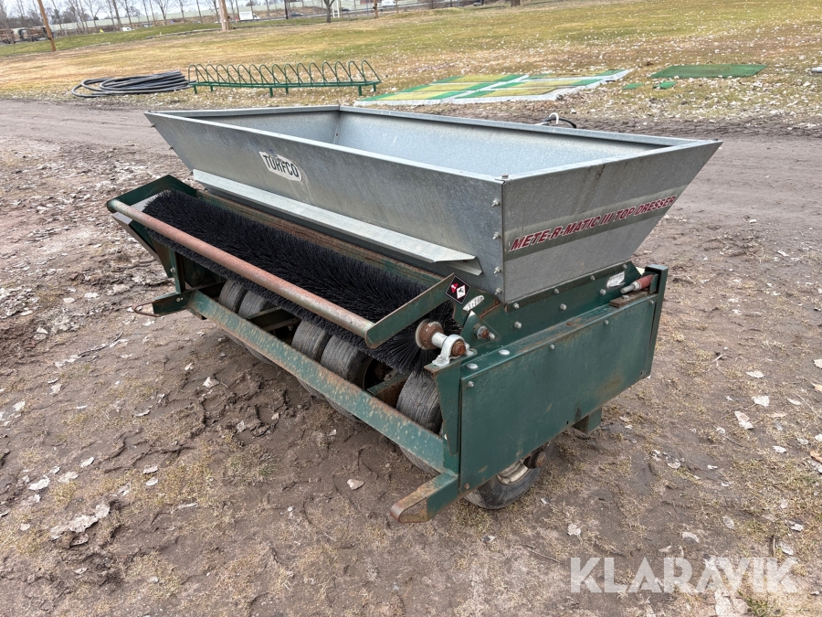 Toppdresser Mete-r-matic III Top dresser