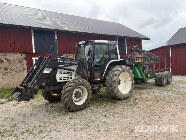 Traktor med skogskärra Valmet 6100 Farma T10
