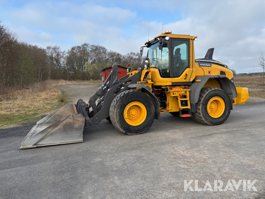Hjullastare Volvo L90H med planeringsskopa