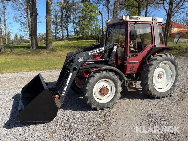 Traktor med lastare INTERNATIONAL 585 XL 4WD