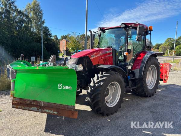 Traktor Case IH Farmall 90A med vikplog och sandspridare