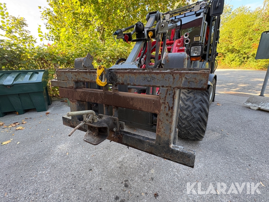 Adapterfäste med sprintdrag samt lyftkrok