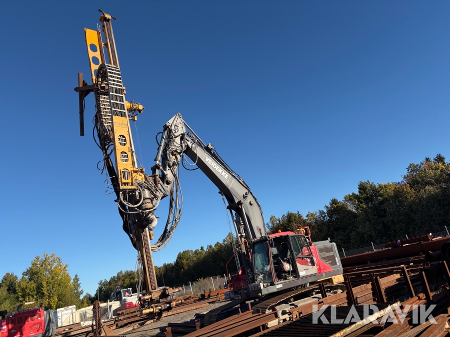 Grävmaskin Volvo EC 250EL med borraggregat