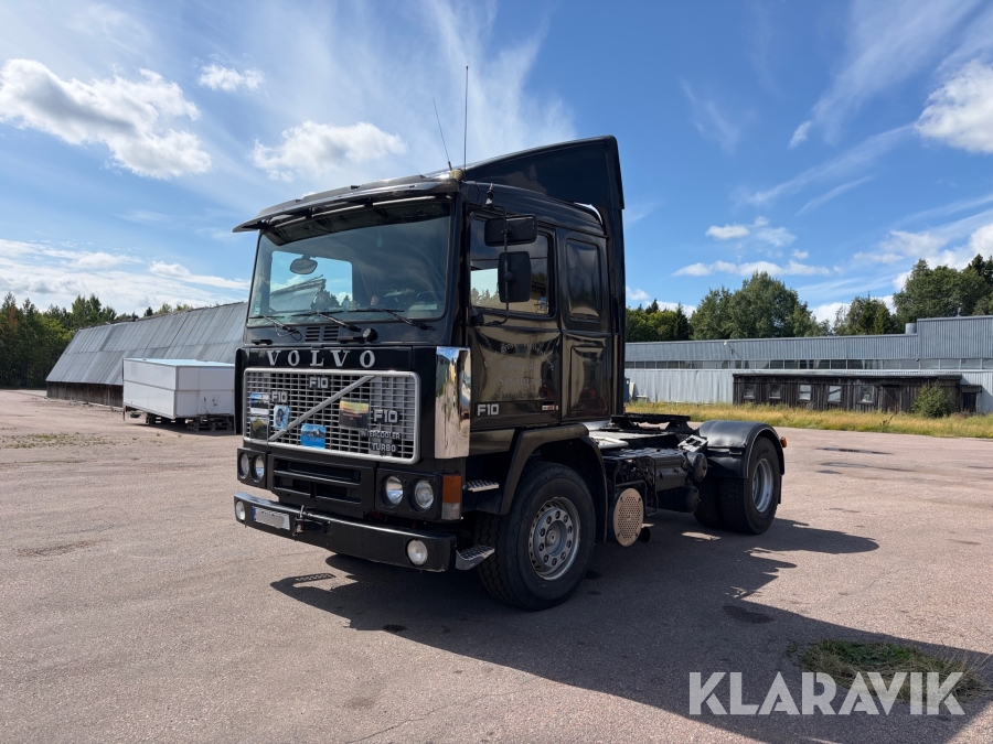 Lastbil Volvo F10 komplett med flak & skåptrailer