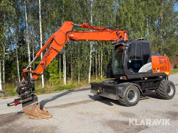 Grävmaskin Hitachi ZX140W-5B med tiltrotator och planeringsskopa