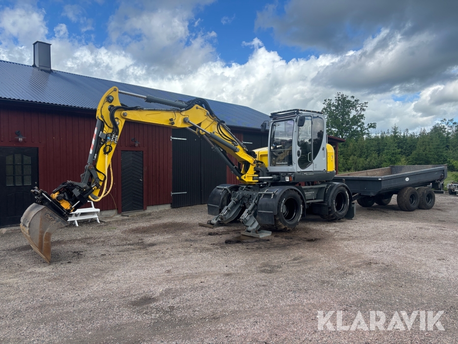 Hjulgrävare Wacker Neuson EW100 med redskap och Bigab vagn