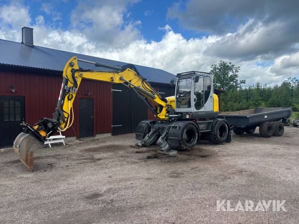 Hjulgrävare Wacker Neuson EW100 med redskap och Bigab vagn