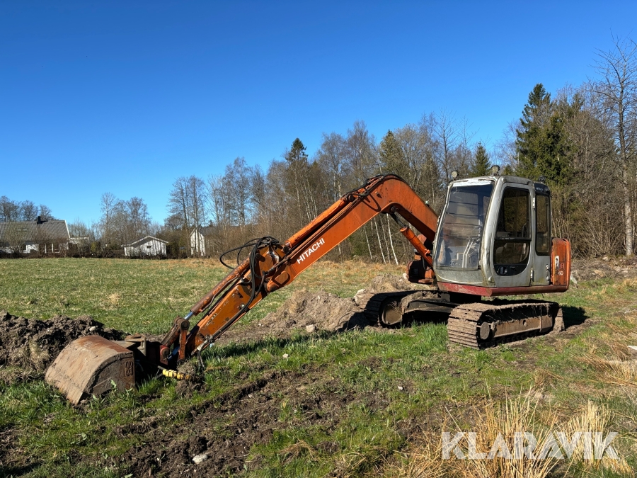 Grävmaskin Hitachi EX60 med skopor och tjälkrok