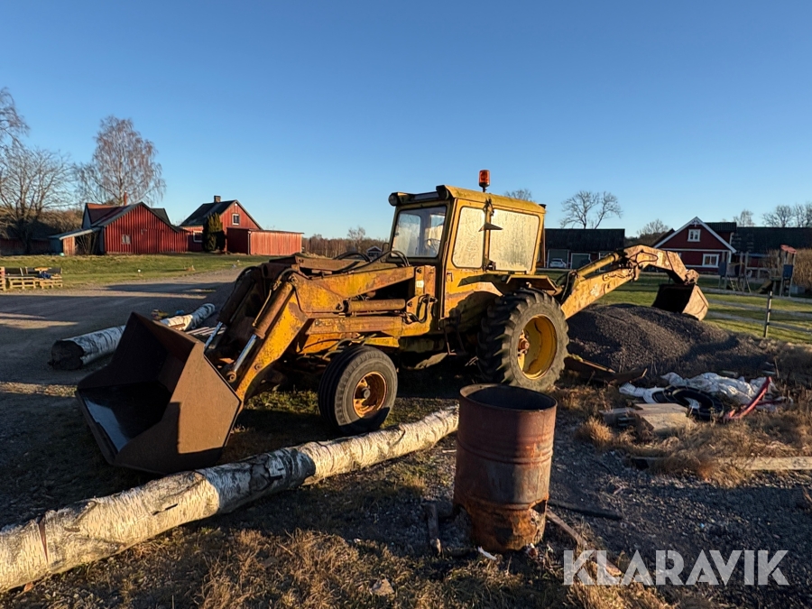 Traktorgrävare Hymas med skopor