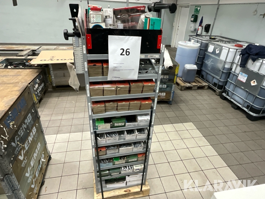 Sortimenthylla med balanseringsvikter och diverse för däckreperation