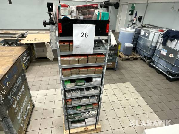 Sortimenthylla med balanseringsvikter och diverse för däckreperation