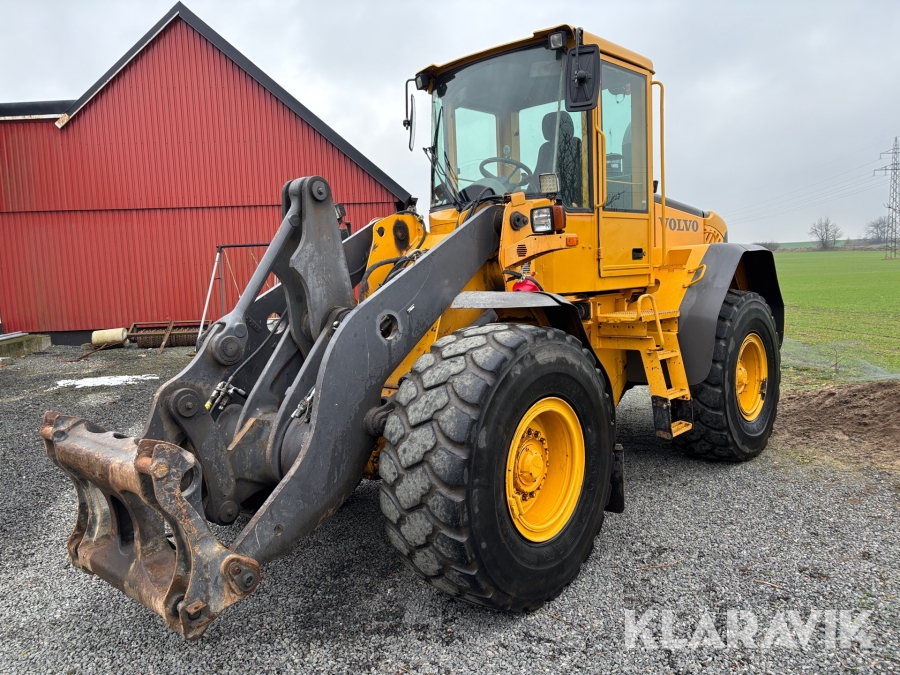 Hjullastare Volvo L70E med skopa och gafflar