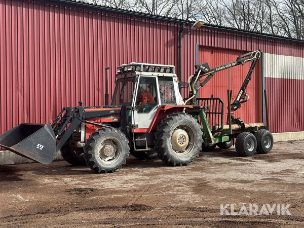Traktor skogsutrustad Massey Ferguson 690 RU med skogsvagn och kran