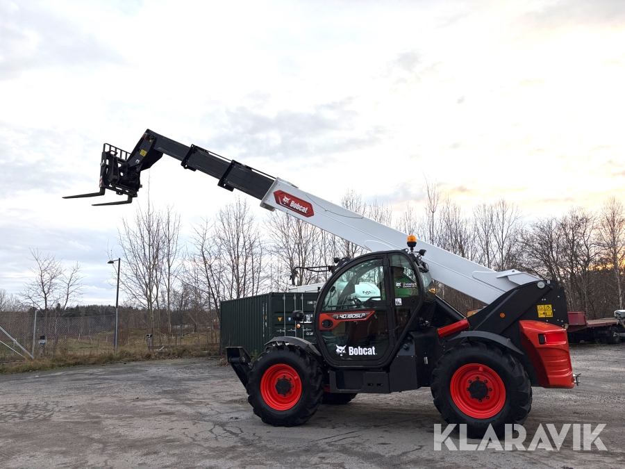 Teleskoplastare Bobcat T40.180 SLPRC med skopa och gafflar