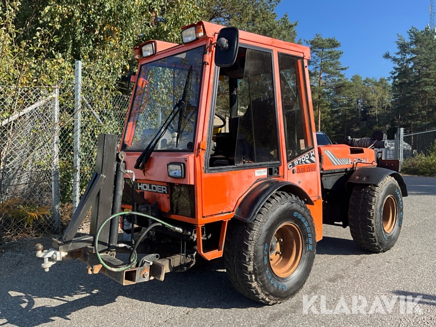 Redskapsbärare Holder C 9700H med vikplog och sopvals