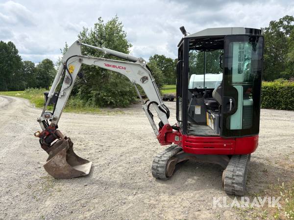 Grävmaskin Takeuchi TB23R med skopor och transportvagn