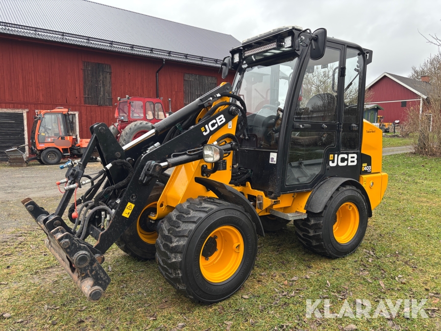 Hjullastare JCB 403 Plus med flera redskap