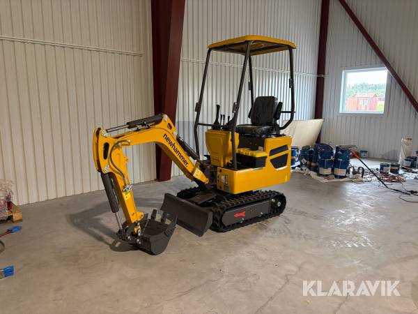Grävmaskin Newhammer JKW 12 med armsving och en skopa