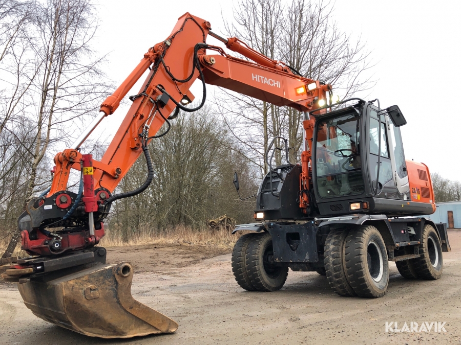 Hjulgrävmaskin Hitachi med tiltrotator, grip och skopa