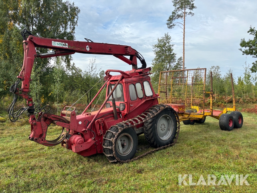 Skotare Massey Ferguson Robur med vagn
