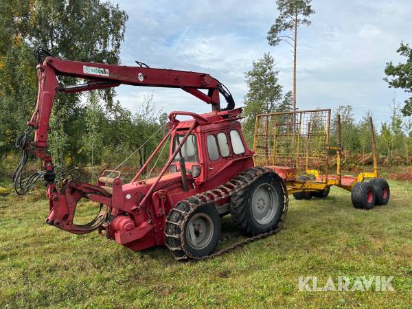 Skotare Massey Ferguson Robur med vagn