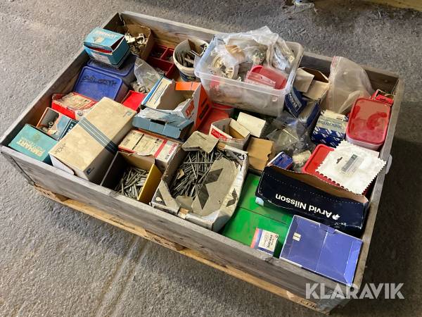 Blandat parti med skruv bult och mutter